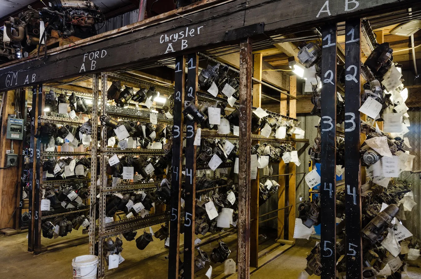 Labeled automotive components organized inside Kiker's